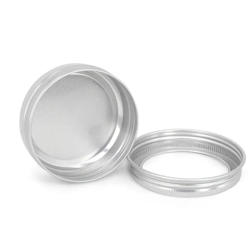 Aluminum tobacco tin with a transparent window