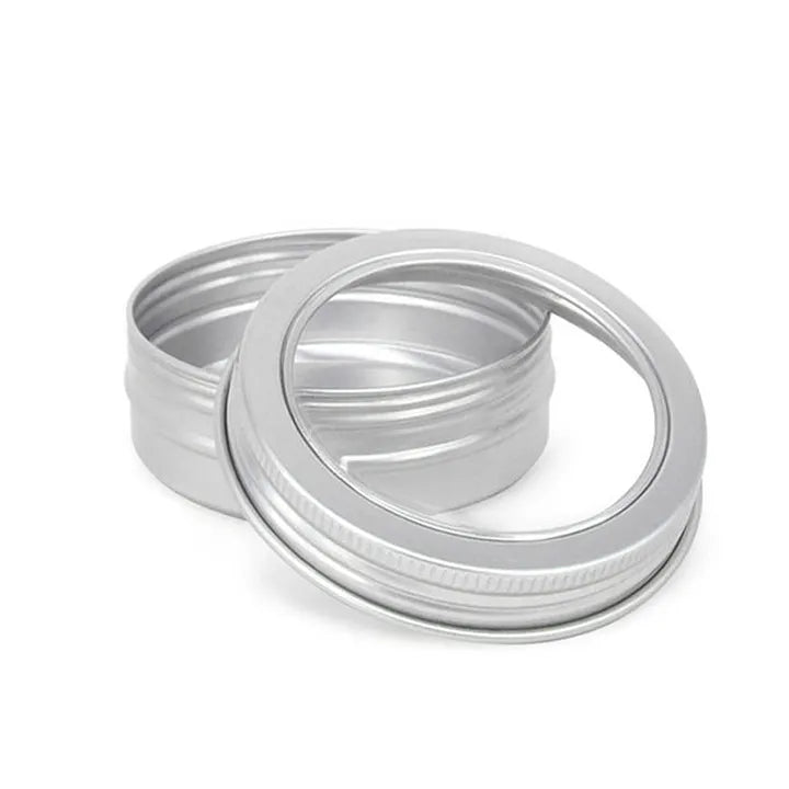 Aluminum tobacco tin with a transparent window