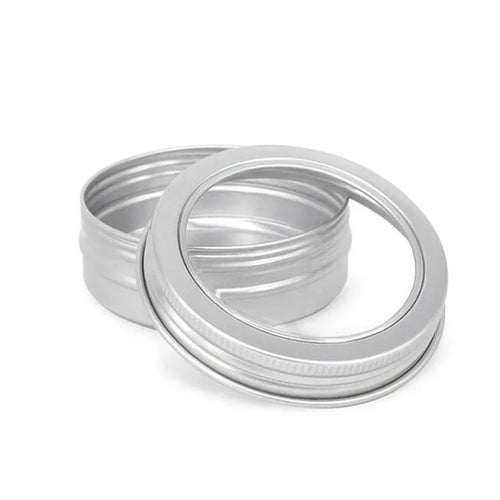 Aluminum tobacco tin with a transparent window